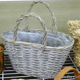 Group of 7 baskets, some are perfect for gift baskets; the largest measures 12"d x 10" tall.