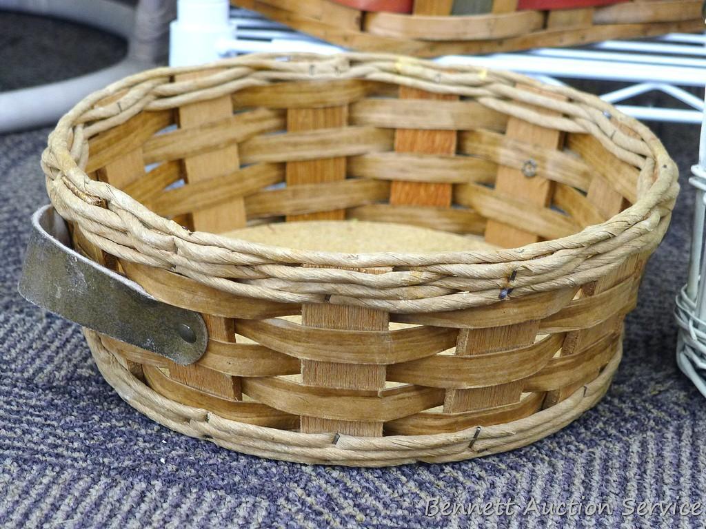 Group of 7 baskets, some are perfect for gift baskets; the largest measures 12"d x 10" tall.