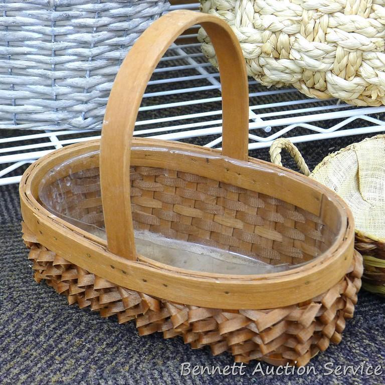 Group of 7 baskets, some are perfect for gift baskets; the largest measures 12"d x 10" tall.