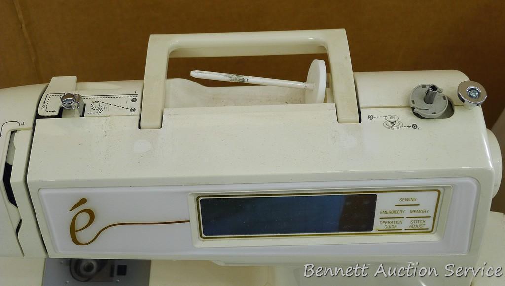 Allure computerized embroidery sewing machine, Model ESL by Baby Lock with accessories. Manual is
