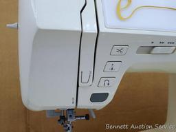 Allure computerized embroidery sewing machine, Model ESL by Baby Lock with accessories. Manual is
