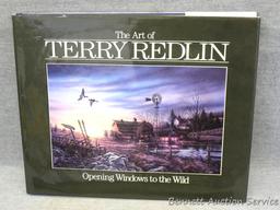 Two Terry Redlin books titled "Master of Memories" and "Opening Windows to the Wild". Copyrighted