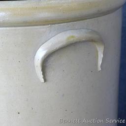 Six gallon salt glazed stoneware crock shows two leaves on front under number and is imprinted 'Red