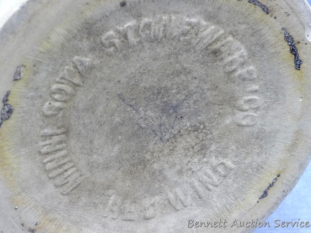 Two gallon salt glazed stoneware crock with bee sting design. Bottom is marked 'Minnesota Stoneware