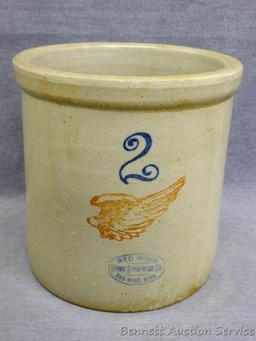 Two gallon Red Wing Union Stoneware crock with large wing is in good condition with a chip noted on