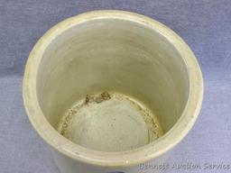 Two gallon Red Wing Union Stoneware crock with large wing is in good condition with a chip noted on