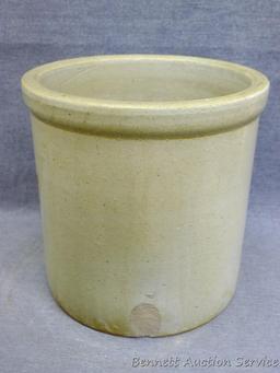 Two gallon Red Wing Union Stoneware crock with large wing is in good condition with a chip noted on