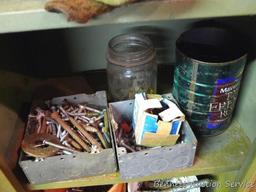 Six shelf metal cabinet filled with screws, nails and more 14-1/2" x 11" x 63" tall.