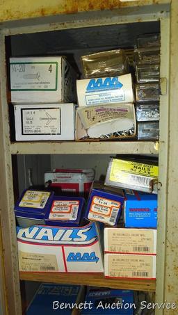 Six shelf metal locker filled with screws, nails and more 12" x 12" x 72" tall.