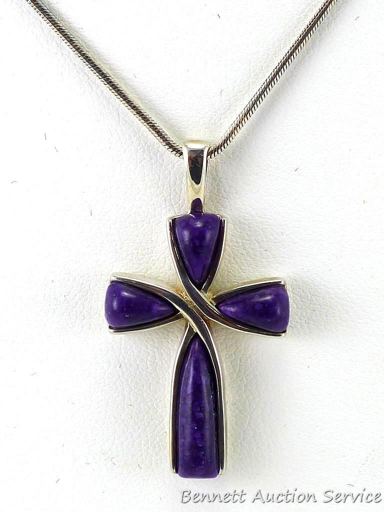 Cross Pendant on a 16" chain; pendant measures 3/4" x 1" and both pendant and chain clasp are