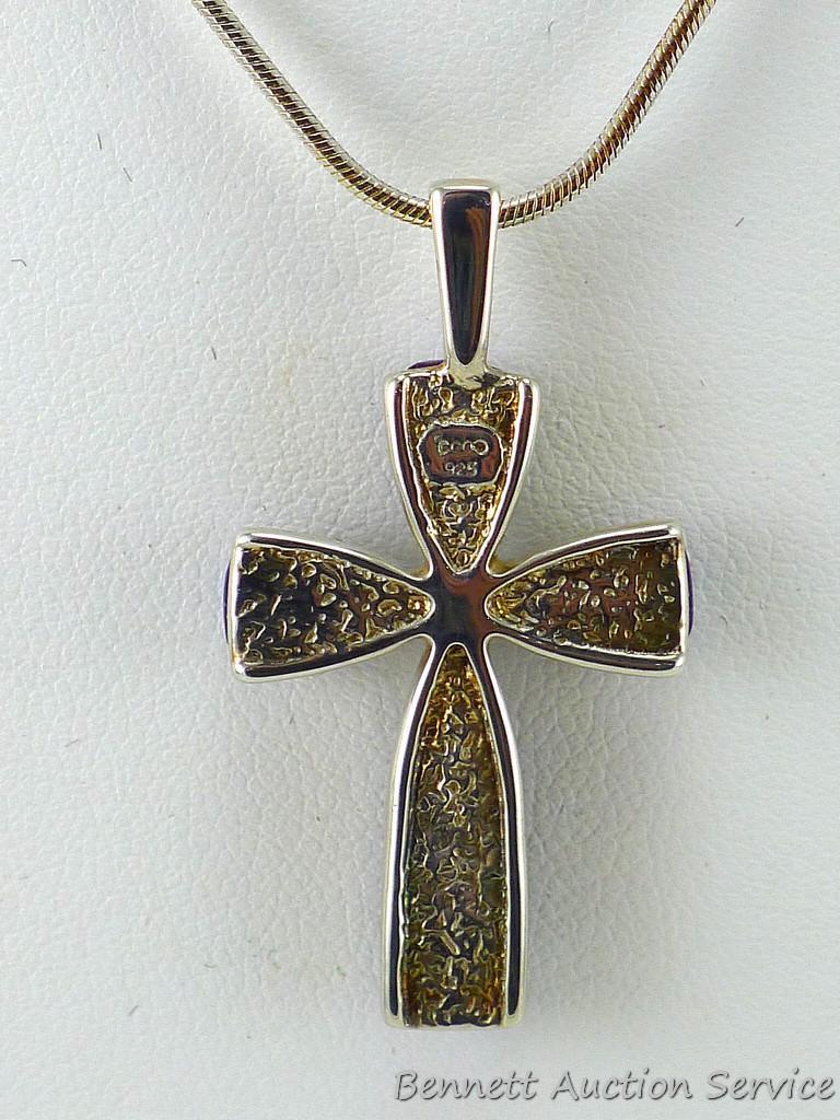 Cross Pendant on a 16" chain; pendant measures 3/4" x 1" and both pendant and chain clasp are