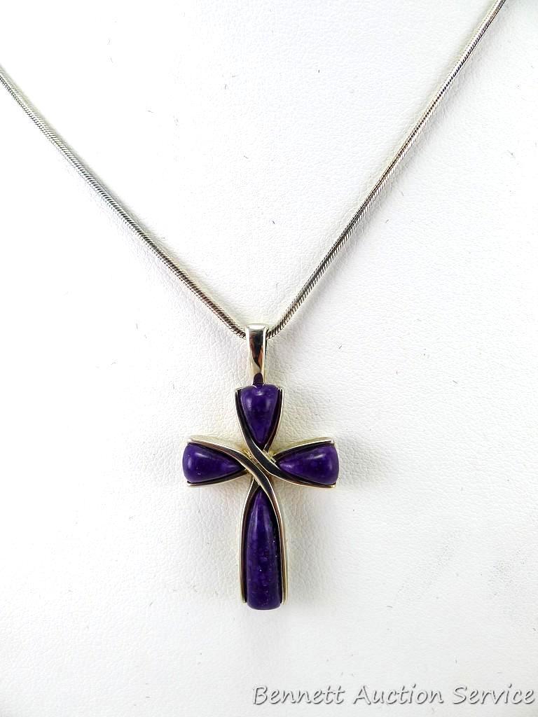Cross Pendant on a 16" chain; pendant measures 3/4" x 1" and both pendant and chain clasp are