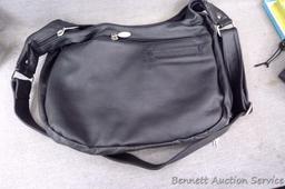 Rama Leathers genuine cowhide leather concealment purse is like new. Bag measures about 14"x 11",