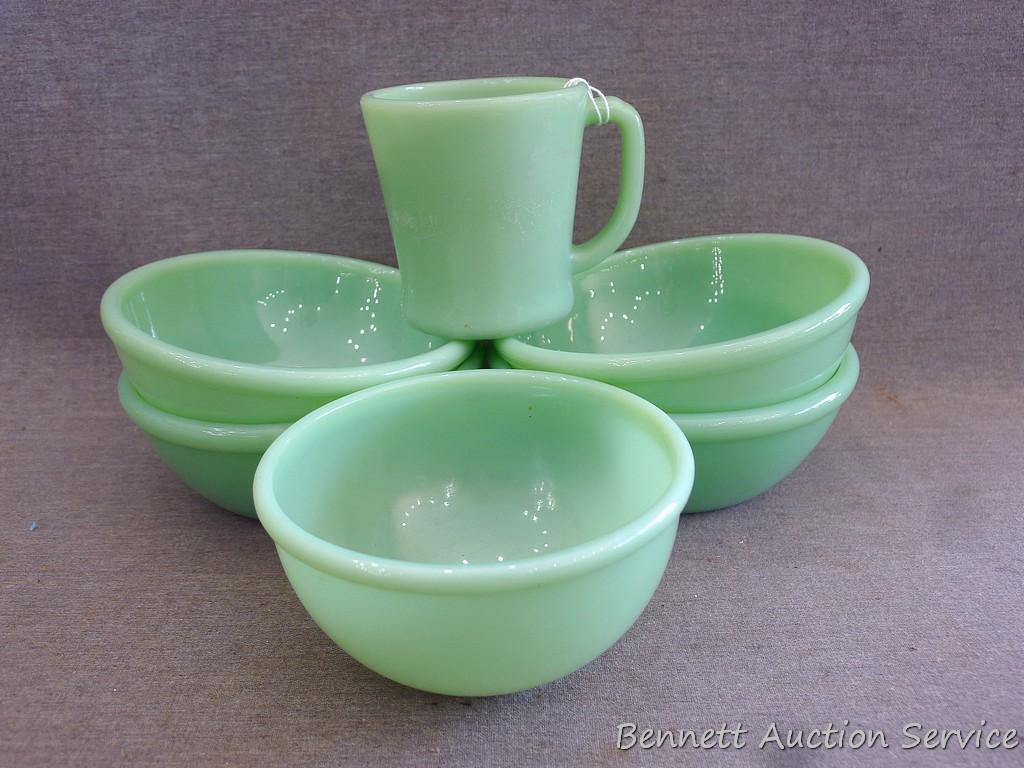 Jadeite Fire-King ware. Four 5-1/2" bowls, one 4-3/4" bowl, one coffee mug.