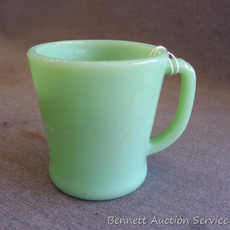Jadeite Fire-King ware. Four 5-1/2" bowls, one 4-3/4" bowl, one coffee mug.
