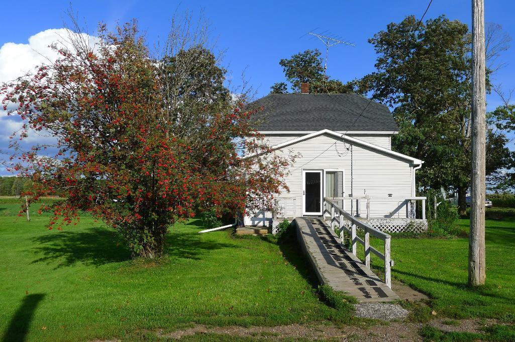 Northern WI country home with huge outbuilding.  Beautifully surrounded by fields and forest.