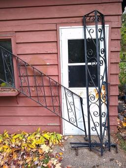 Wrought iron railing section is approx. 7' long; matching upright piece is approx. 8' tall.