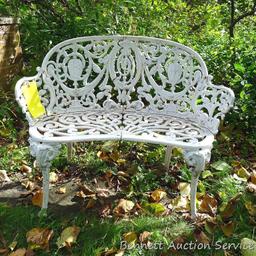 Cast iron garden bench is 3' wide.