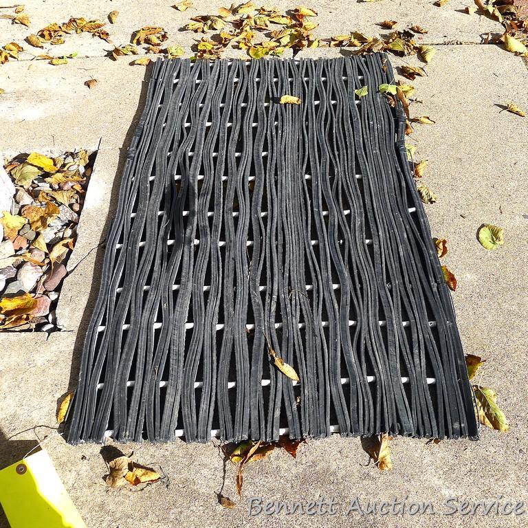Two nice heavy duty rubber entry mats, larger measures approx. 5' x 2'.