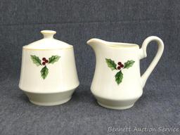 Stoneware sugar and creamer, Poinsetta and Ribbons salt and pepper shakers. Tiny chip or factory
