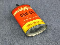 Vintage Winchester 3 oz gun oil can is 4-1/2" x 2-1/4" x 1". Graphics are nice, cast metal spout,
