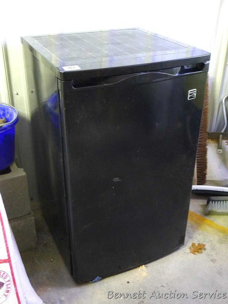 Kenmore dorm sized refrigerator/freezer is 20" x 21" x 34" tall. Runs and cools. Needs cleaning.