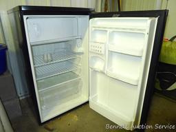 Kenmore dorm sized refrigerator/freezer is 20" x 21" x 34" tall. Runs and cools. Needs cleaning.