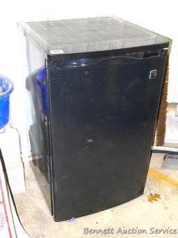 Kenmore dorm sized refrigerator/freezer is 20" x 21" x 34" tall. Runs and cools. Needs cleaning.