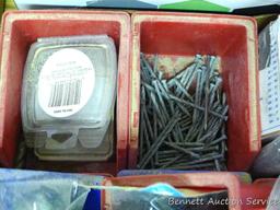 Plastic storage containers 4" x 6" x 3" partially filled with roofing nails, lag screws, regular