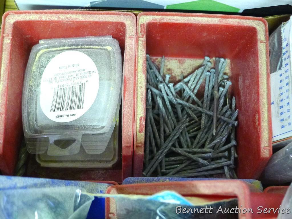 Plastic storage containers 4" x 6" x 3" partially filled with roofing nails, lag screws, regular