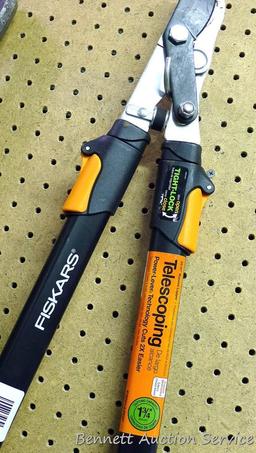 Fiskars Telescoping pruner cuts up to 1-3/4" diameter. Extends to 37" length.