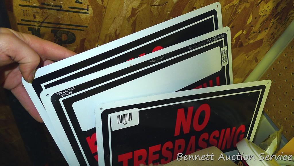 Five no trespassing signs, appear new; 2 rolls of paper towel 9-1/2" x 5-1/2"; steel wool; mounting