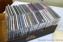 Box of CDs incl Wayne Jennings, Conway Twitty, Toby Keith, Vince Gill, Clint Black, Randy Travis,