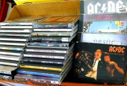 Box of CD's including Bob Dylan, Kenny G., Neil Diamond, Bob Seger, Led Zeppelin, AC/DC and more.