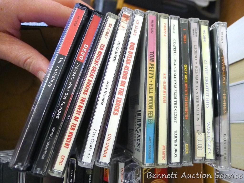 Box of CD's including Bob Dylan, Kenny G., Neil Diamond, Bob Seger, Led Zeppelin, AC/DC and more.