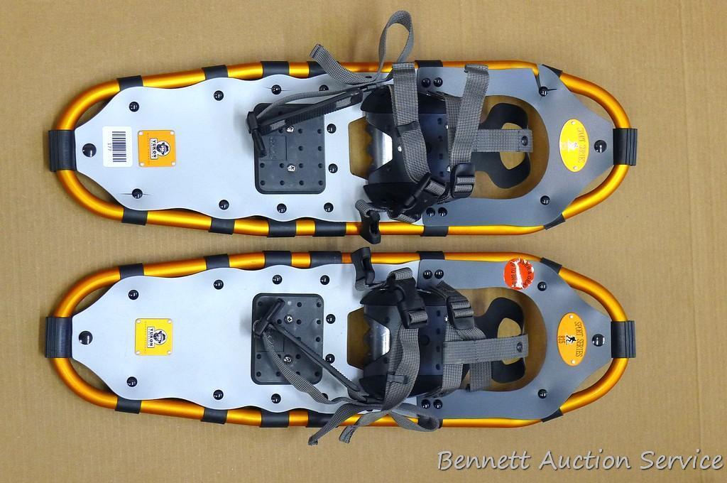 Yukon Charlie's Sport Series 825 aluminum framed snowshoes are 8" x 25" and appear in nice condition