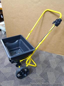 YardWorks broadcast spreader has 11 settings and bucket measures approx. 18" x 13". Good condition.