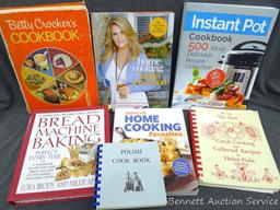 Stack of cook books for the chef in the family. Topics include Instant Pot, Trisha Yearwood, Polish