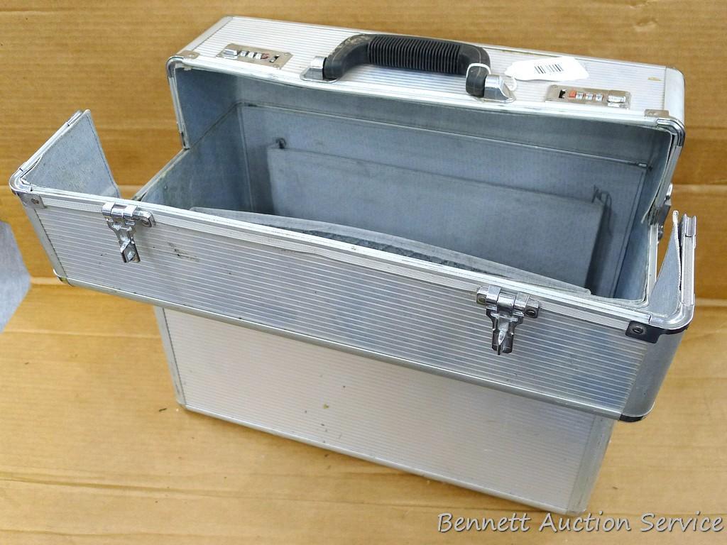 Aluminum storage case 18" x 15" x 9" with combination locks and fold down tops sections for access.