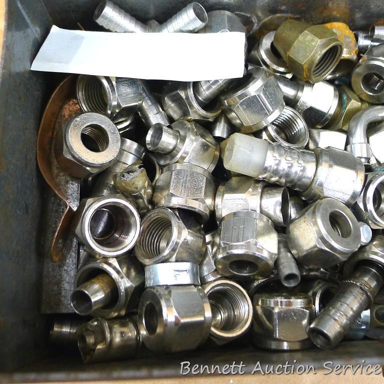 Metal storage box 9-1/2" x 5" x 4-3/4" with a variety of fittings for air lines on trucks (we