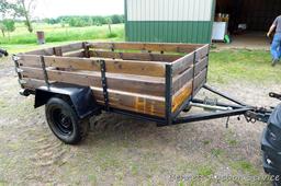 Nice utility trailer is wired for the road. Rear gate swings to the side. Bed is approx. 8' x 5'.