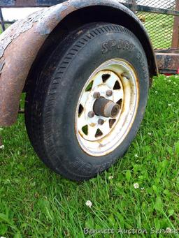 Big Max expanded metal utility ATV trailer with drop ramp and removeable sides. Bed is approx. 8' x