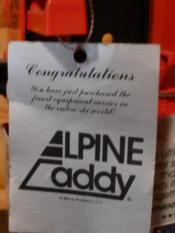 Bob's invention - Alpine Caddy. Two sets of carriers for skis, poles and boots that fits on your car