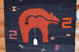 Woven Native American wall hanging is approx. 5' x 2-1/2'. Nice colors.