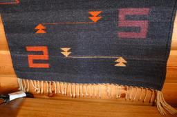 Woven Native American wall hanging is approx. 5' x 2-1/2'. Nice colors.