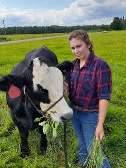 Maggie Peterson selling 1301 lb. steer.  Price is per pound.