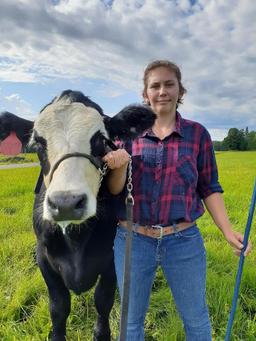 Maggie Peterson selling 1301 lb. steer.  Price is per pound.