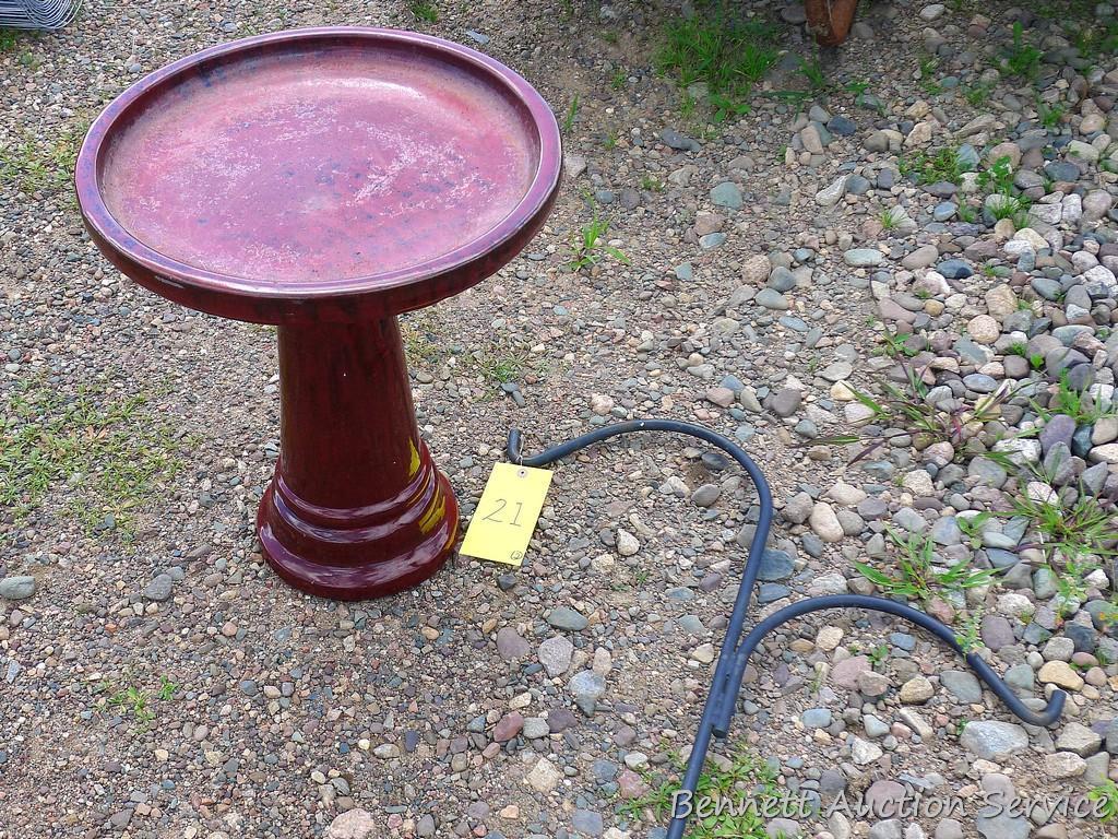 Seven foot wrought iron shepherds hook; two piece glazed terra cotta bird bath is 19" x 23".