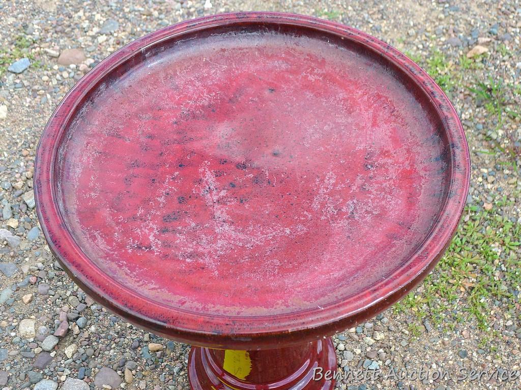 Seven foot wrought iron shepherds hook; two piece glazed terra cotta bird bath is 19" x 23".