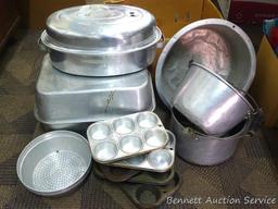 Roasters, strainer, muffin tins, pots, more. Box is 21" long.